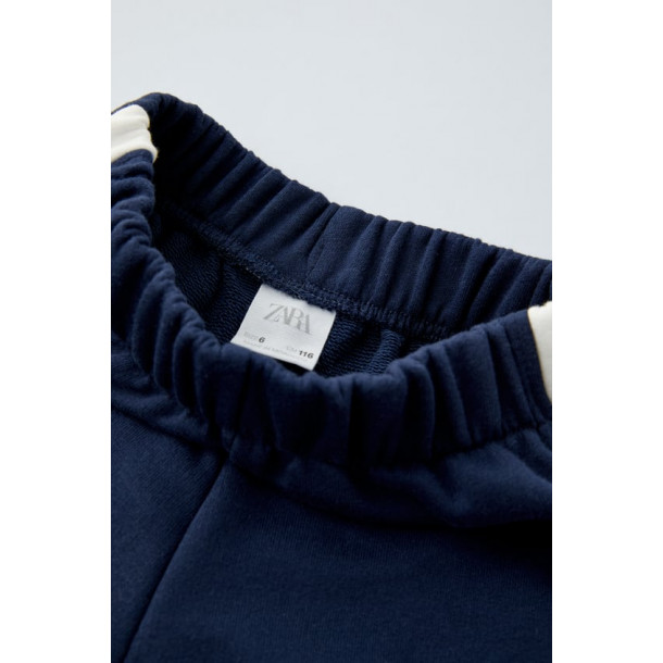 Спортивні штани синього кольору з смужками H&M